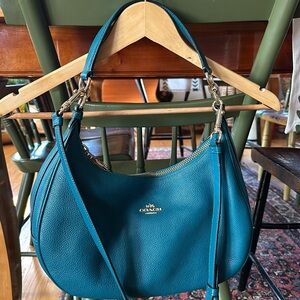 COACH like new leather teal coach bag with two straps.